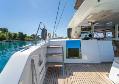 A view of the spacious rear deck of the Lagoon 560 catamaran with a seabob waiting to be driven.